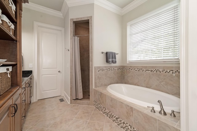 bathroom featuring shower with separate bathtub, ornamental molding, tile patterned floors, and vanity