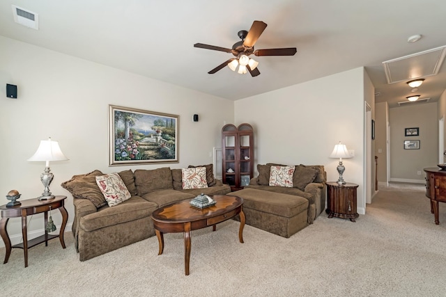 living room with light colored carpet and ceiling fan