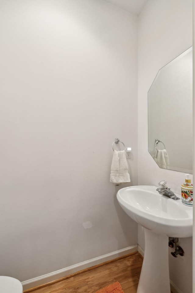 bathroom featuring hardwood / wood-style floors