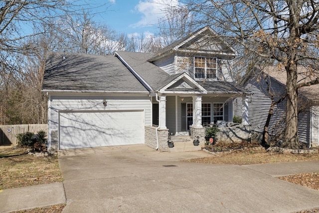 craftsman-style house featuring a garage and a porch