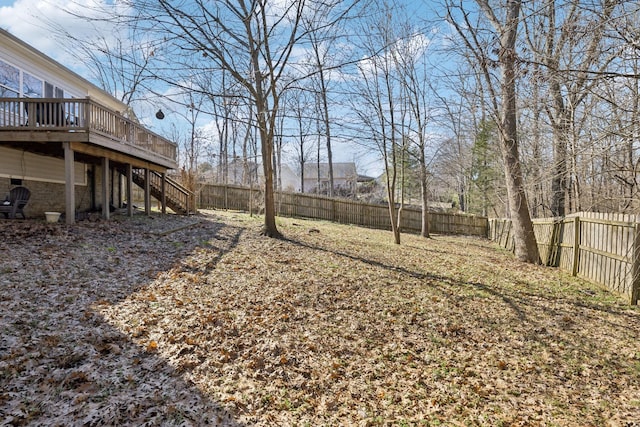 view of yard with a deck