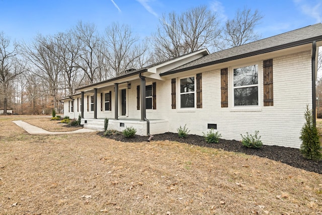 view of front of home with a porch and a front lawn