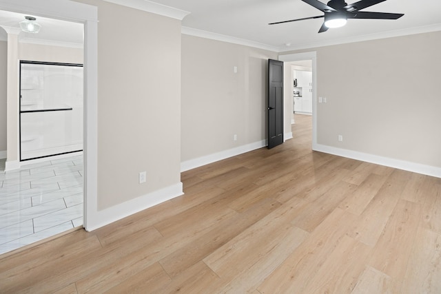 spare room with crown molding, ceiling fan, and light wood-type flooring