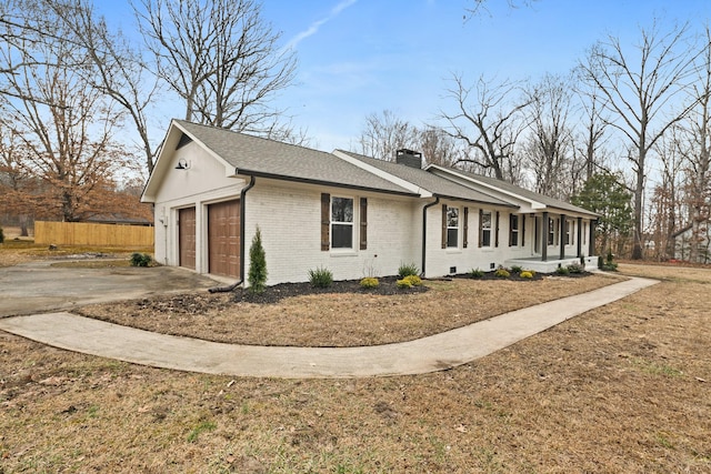 view of side of property featuring a garage