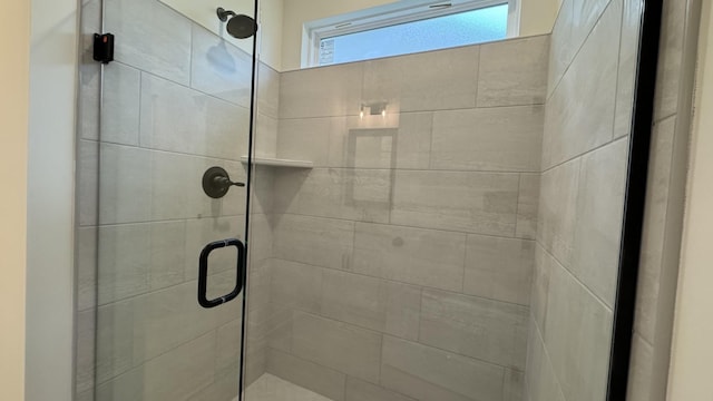 bathroom with an enclosed shower