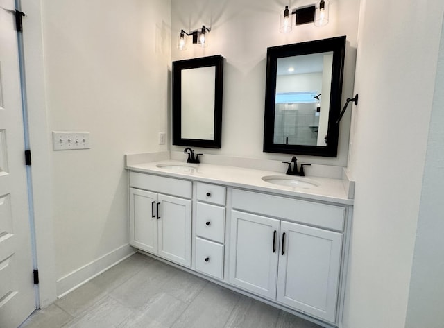 bathroom featuring vanity and a shower