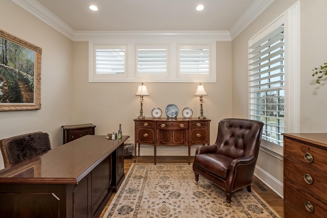 sitting room featuring crown molding and light wood-type flooring