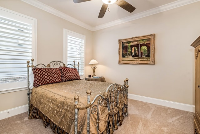 bedroom with ornamental molding, carpet floors, and ceiling fan