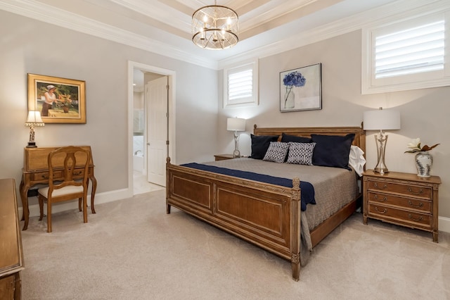 carpeted bedroom featuring a tray ceiling, connected bathroom, crown molding, and an inviting chandelier