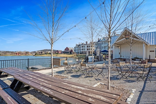 exterior space with a water view