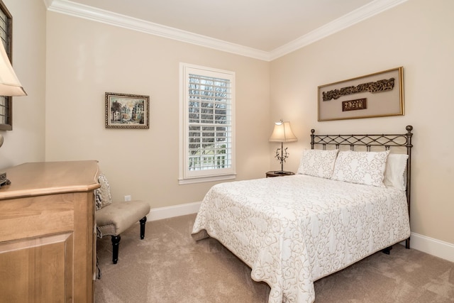 carpeted bedroom with ornamental molding