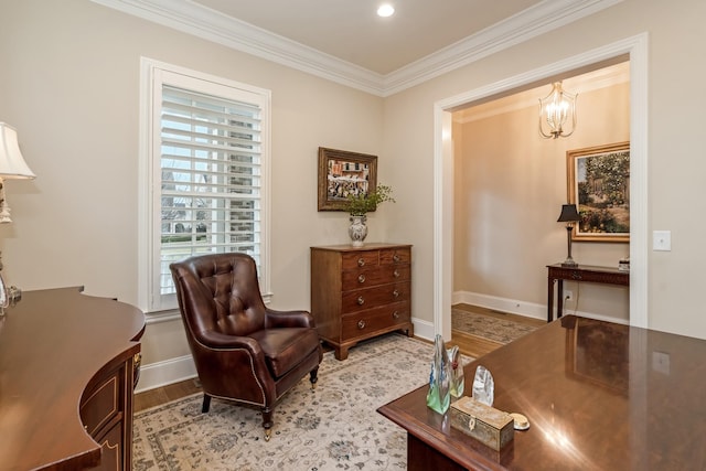 sitting room featuring ornamental molding and light hardwood / wood-style flooring