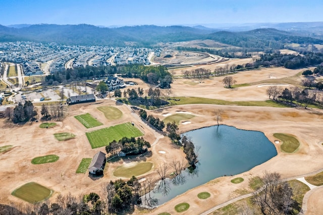 bird's eye view with a water and mountain view