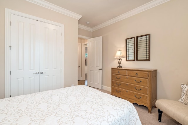 bedroom with light carpet, crown molding, and a closet