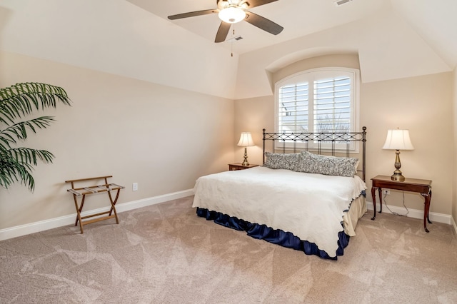 carpeted bedroom with ceiling fan and lofted ceiling