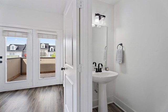 bathroom featuring hardwood / wood-style flooring and sink