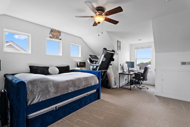 carpeted bedroom featuring ceiling fan and lofted ceiling