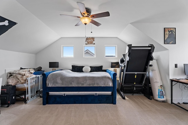 bedroom with light carpet, vaulted ceiling, and ceiling fan