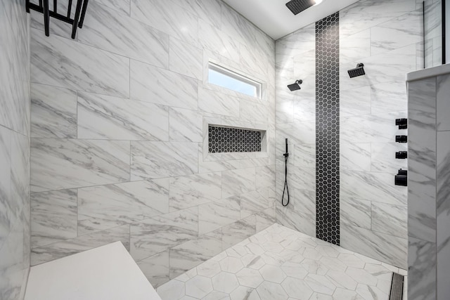 full bathroom featuring a tile shower