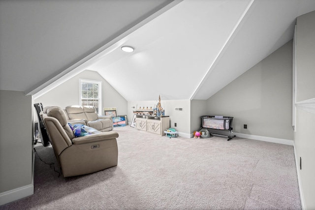 interior space with vaulted ceiling and baseboards