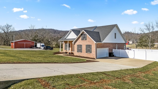 view of front facade featuring a garage, brick siding, concrete driveway, a gate, and a front lawn