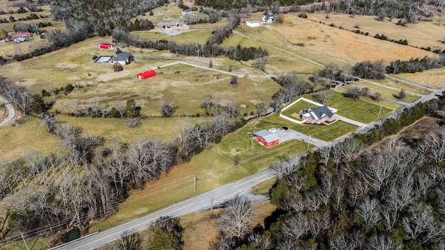 birds eye view of property featuring a rural view