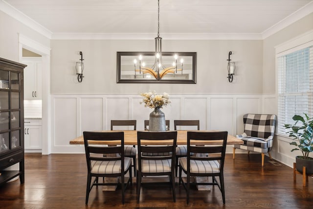 dining room featuring an inviting chandelier, ornamental molding, dark hardwood / wood-style flooring, and a wealth of natural light