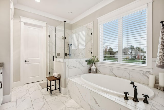 bathroom featuring independent shower and bath