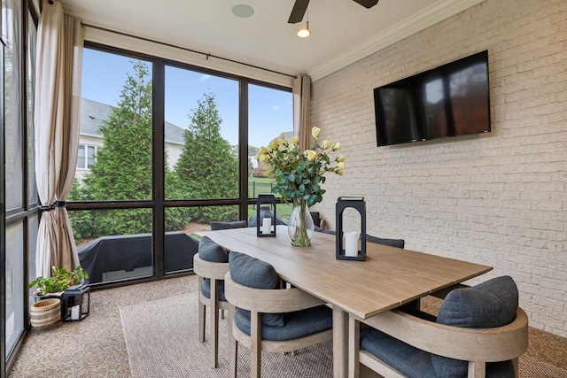 sunroom / solarium with ceiling fan