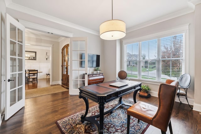 home office featuring french doors, ornamental molding, and dark wood-type flooring