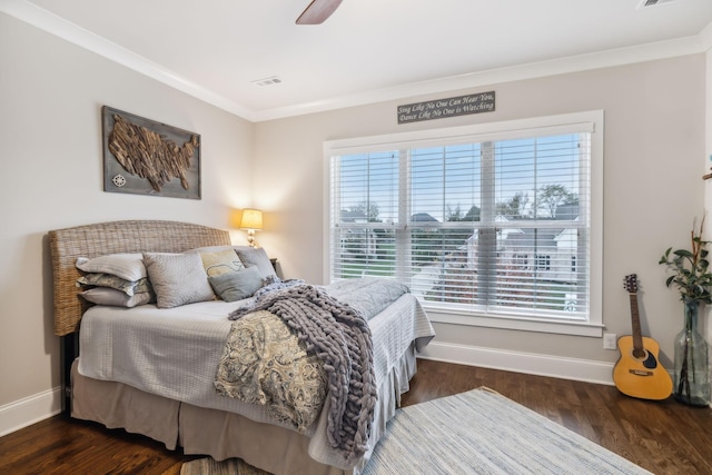 bedroom with multiple windows, ornamental molding, dark hardwood / wood-style floors, and ceiling fan