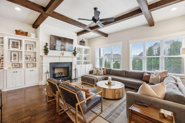 living room with dark hardwood / wood-style flooring, coffered ceiling, and beamed ceiling