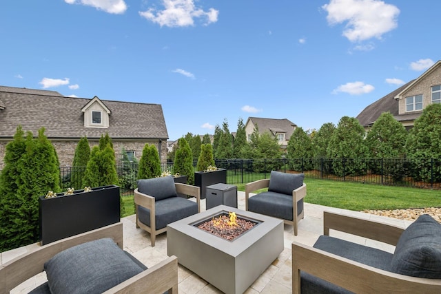 view of patio with a fire pit