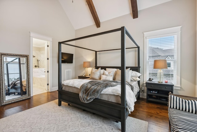 bedroom featuring ensuite bathroom, dark hardwood / wood-style flooring, high vaulted ceiling, and beam ceiling