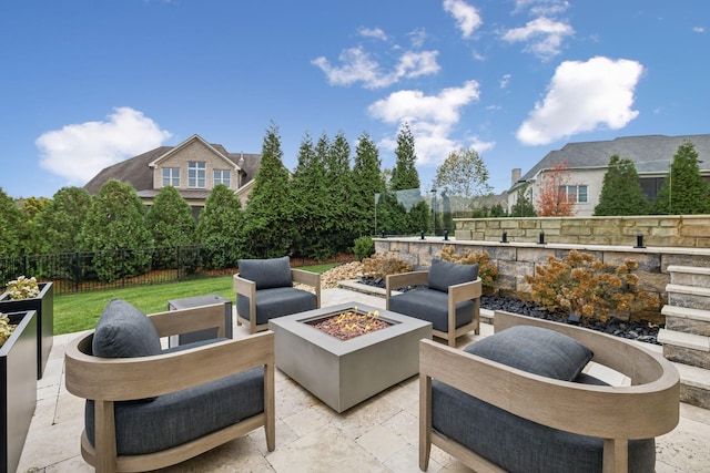 view of patio featuring a fire pit