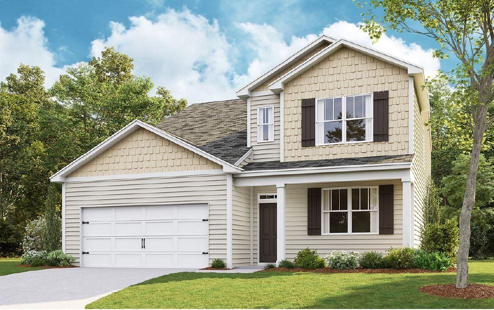 view of front of property with a garage and a front yard