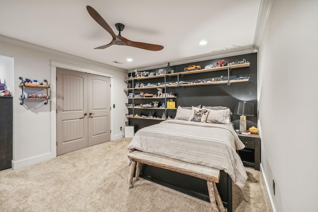 bedroom featuring recessed lighting, carpet flooring, a ceiling fan, baseboards, and ornamental molding