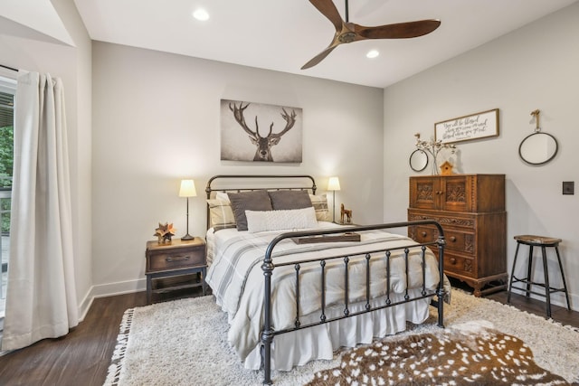 bedroom featuring a ceiling fan, recessed lighting, dark wood finished floors, and baseboards