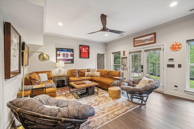 living room with recessed lighting, baseboards, french doors, dark wood-style floors, and crown molding