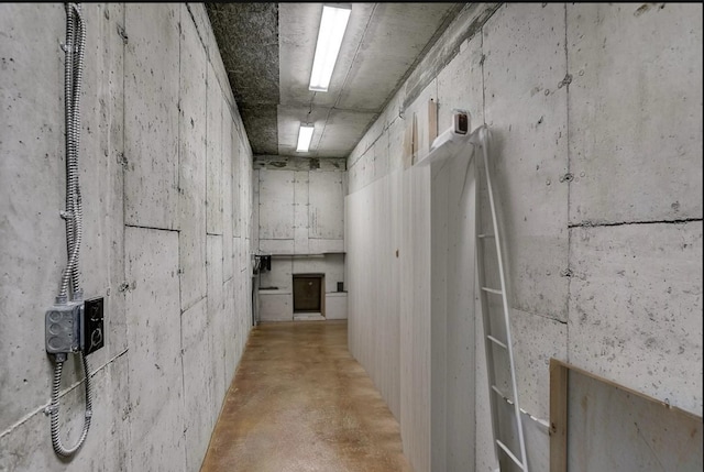 corridor with concrete floors