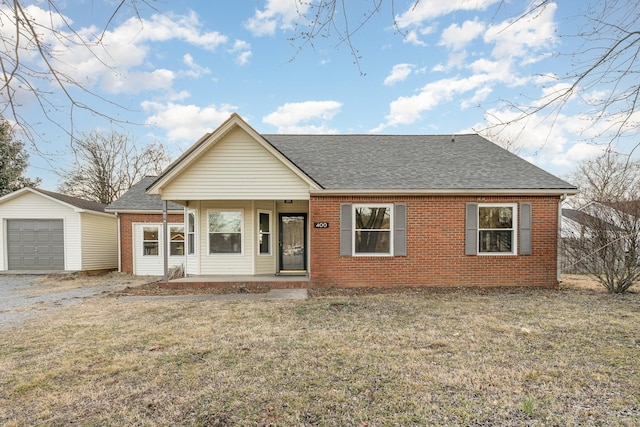 ranch-style house with brick siding and roof with shingles