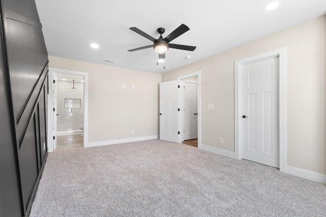 unfurnished bedroom with recessed lighting, carpet flooring, visible vents, and baseboards