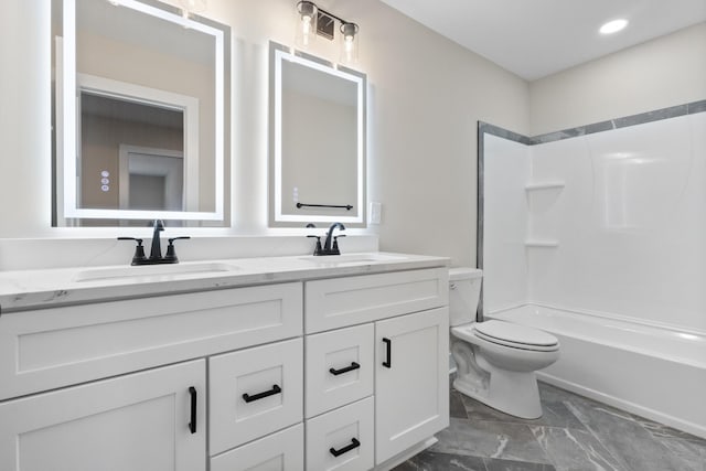 full bathroom featuring recessed lighting, a sink, toilet, and double vanity