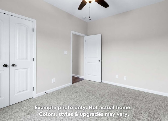 unfurnished bedroom featuring carpet and ceiling fan