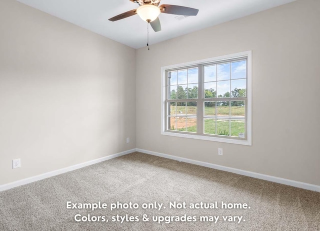 unfurnished room featuring ceiling fan and carpet floors