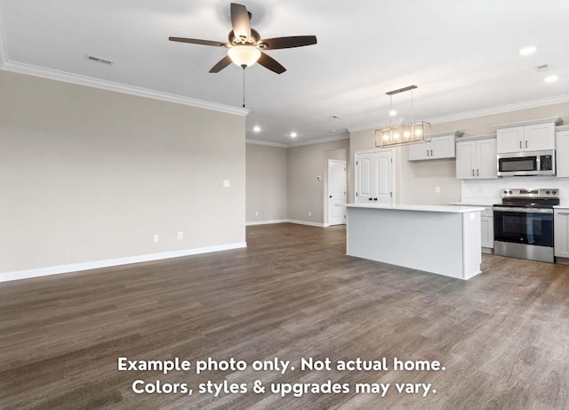 kitchen featuring appliances with stainless steel finishes, pendant lighting, white cabinets, dark hardwood / wood-style flooring, and a center island