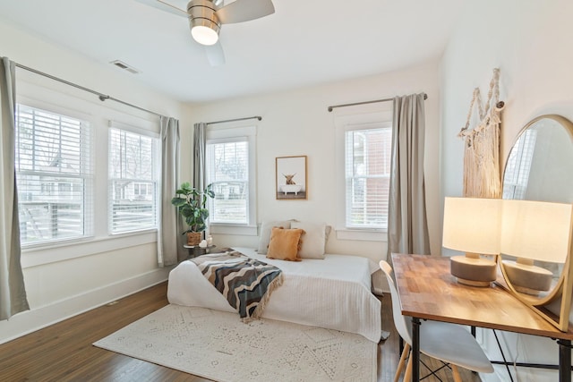 bedroom featuring dark wood-type flooring and ceiling fan