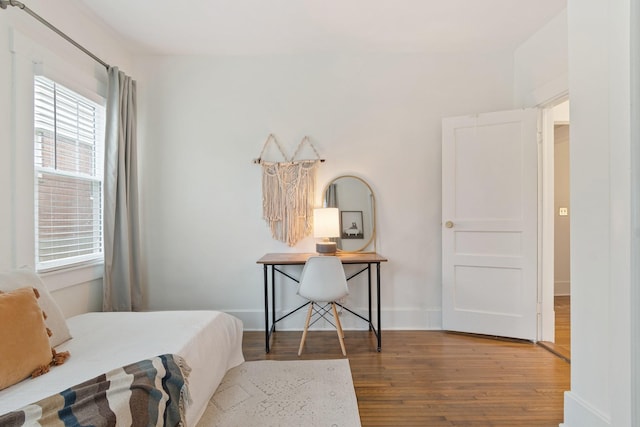 bedroom featuring wood-type flooring