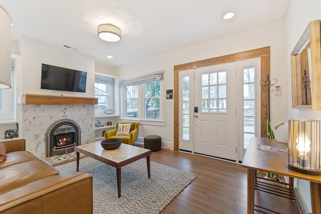 living room with dark wood-type flooring