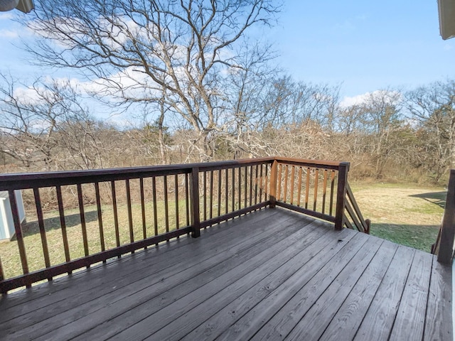 wooden deck with a yard